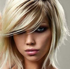 coupe-femme-visage-rond-a-la-mode-2014.jpg